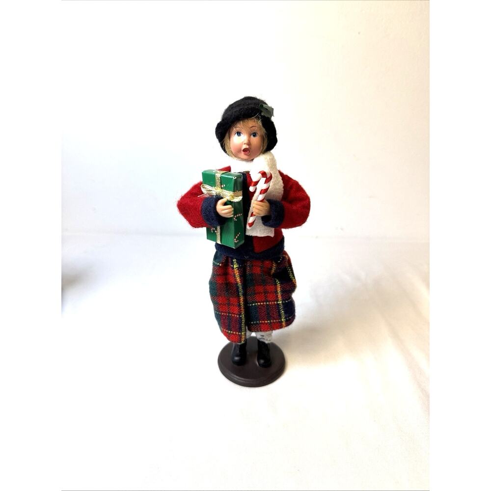 Buyers Choice Christmas Girl With Present Roll Figurine